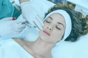 A woman at her first dermal filler appointment