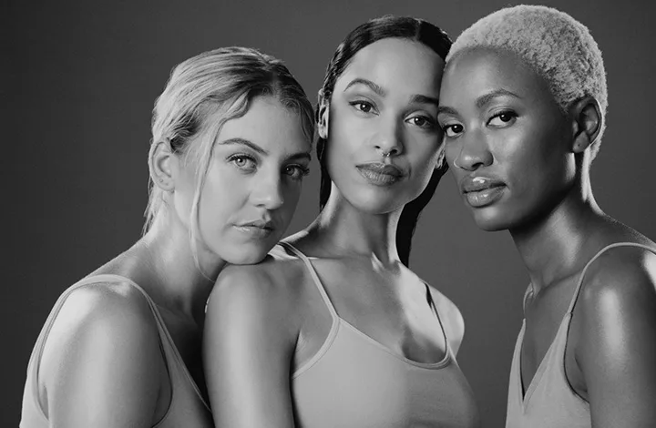 a group of women with smooth, hydrated skin