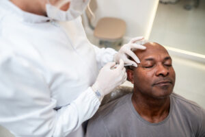 a man receives botox at a clinic in asheville nc